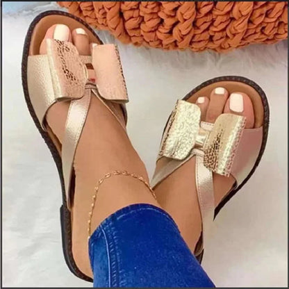 Butterfly button sandals with flat sole