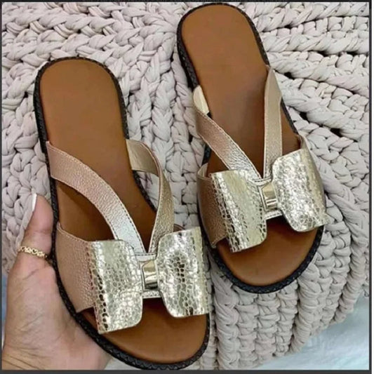 Butterfly button sandals with flat sole